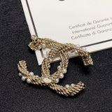 18K CC Pearl Twist Gold Brooch